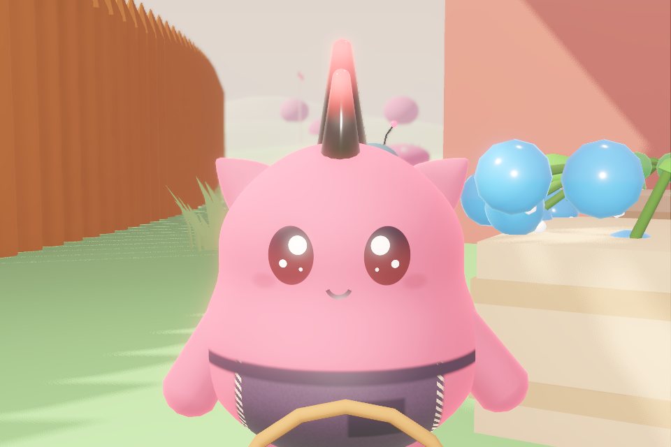A pink villager photographed up close outdoors